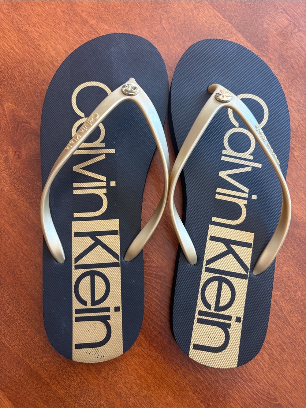 Calvin Klein Black & Gold Logo Flip Flops